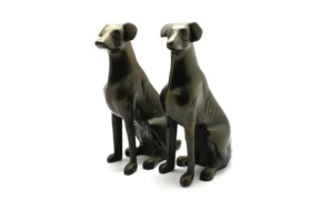 Pair of vintage bronze seated dogs